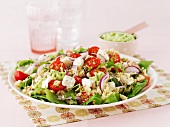 Rice salad with tomatoes and feta with guacamole