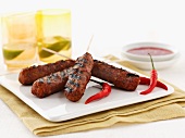 Minced meat kebabs with chilli peppers