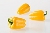 Three yellow peppers