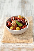 Marinated olives and dried tomatoes (tapas, Spain)