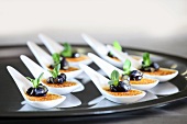 Creme brulee on canape spoons
