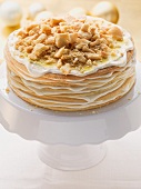 Layered honey cake on a cake stand