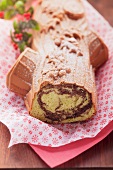 Christmas pistachio cake made using a log-shaped baking tin