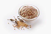 Mustard seeds, whole and ground