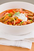 Solyanka (Eastern European meat stew with vegetables and sour cream)
