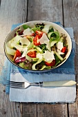 Mixed leaf salad with cherry tomatoes, cucumber and Parmesan