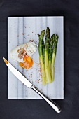 Poached egg with green asparagus