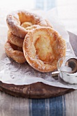 Bavarian-style doughnuts with sugar on baking paper