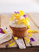 A cupcake decorated with flowers