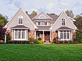 Home with Stone Exterior and a Large Lawn