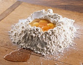 Ingredients for yeast dough (flour, eggs)