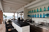 Open-plan bar with sea view