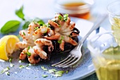Grilled octopus with lemon and parsley