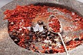 Roughly crushed spices in a mortar