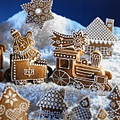 A gingerbread Christmas scene with a steam train