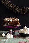 Chocolate cake with a meringue topping for Christmas