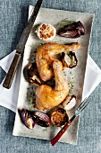 Chicken legs with thyme, garlic and red onions