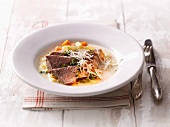 Boiled beef with vegetables and horseradish