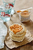 Peanut and chilli sauce in a jar and on unleavened bread