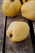 Quinces on a wooden table