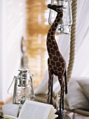 Wooden giraffe and lantern ornaments