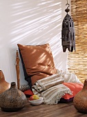African-style room with cushions and vases on floor