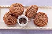 Piped chocolate biscuits with filling