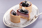 Small Baumkuchen (German layer cakes) filled with blackberry cream