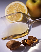 White wine, almonds, an apple and half a lemon