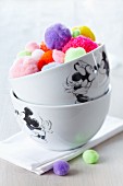 Mickey Mouse bowls filled with colourful pompoms