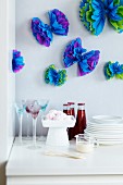 Tissue paper party decorations on wall