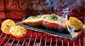Salmon Topped with Lemon and Dill on an Applewood Plank; On the Grill