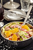 Chicken and avocado salad with oranges, red onion and dill