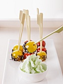 Cherry tomato skewers with sesame seeds and a wasabi dip