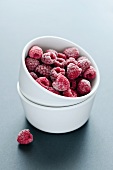 A ramekin of frozen raspberries