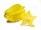 A whole star fruit and a slice of star fruit
