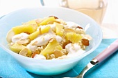 Sweet couscous with pineapple, raisins and sliced almonds