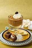 Chocolates and a chocolate mousse with orange and mascarpone