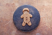 Decorated Gingerbread Man Cookie with a Glass of Milk