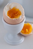 A boiled egg with the top cut off (close-up)