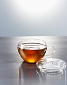 Black tea in a glass teacup