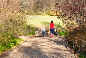 A mother and daughter gardening