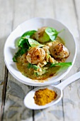 Spinach and lentils with fried scallops