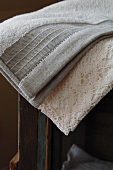 High-quality towel and lace cloth in old-fashioned, natural look