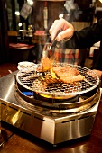 Yakiniku Wagyu being grilled at the table