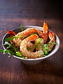 Prawns coated in sesame seeds with vegetables