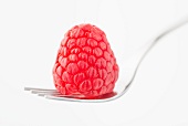 A raspberry on a fork