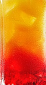 A glass of Tequila Sunrise (close-up)
