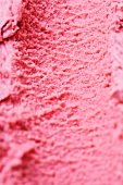 The surface of fresh blackberry ice cream from above