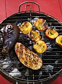 Peaches and aubergines cooked on the barbecue
